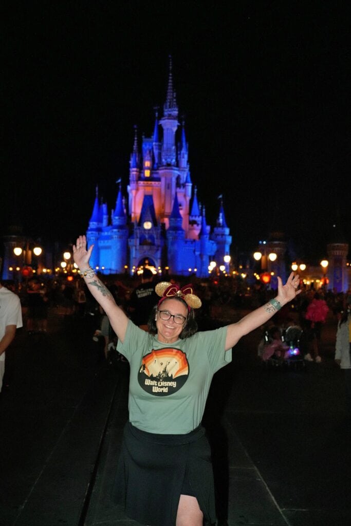 Enchanting Disney castle illuminated at night, celebrating magical Disney vacations with Dream Come True Vacations. Perfect for creating unforgettable family memories at Walt Disney World.